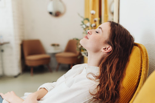 woman sitting in a relaxed state